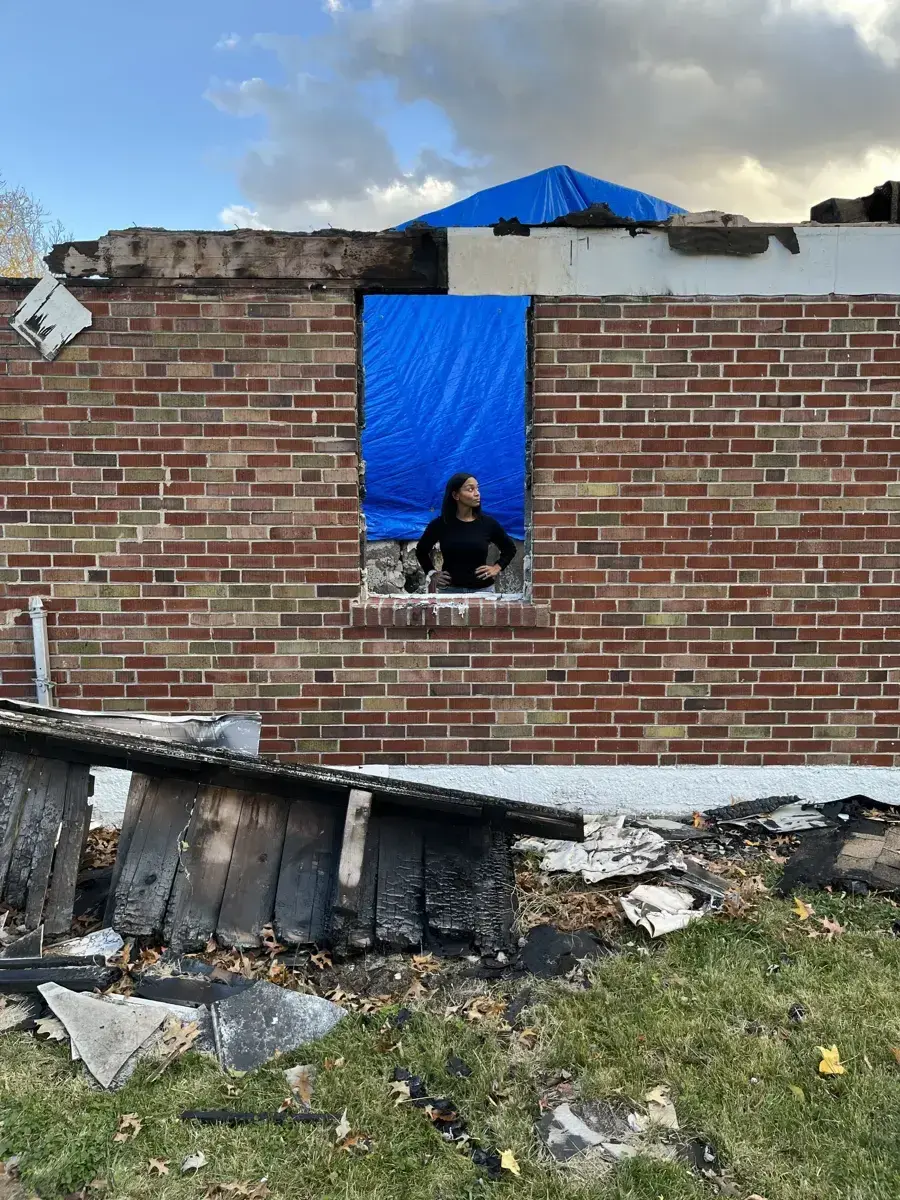 Billings before: fire-damaged brick wall